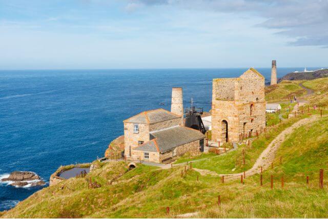 View of the coast and sea with Levant Mine and Beam Engine in Cornwall.