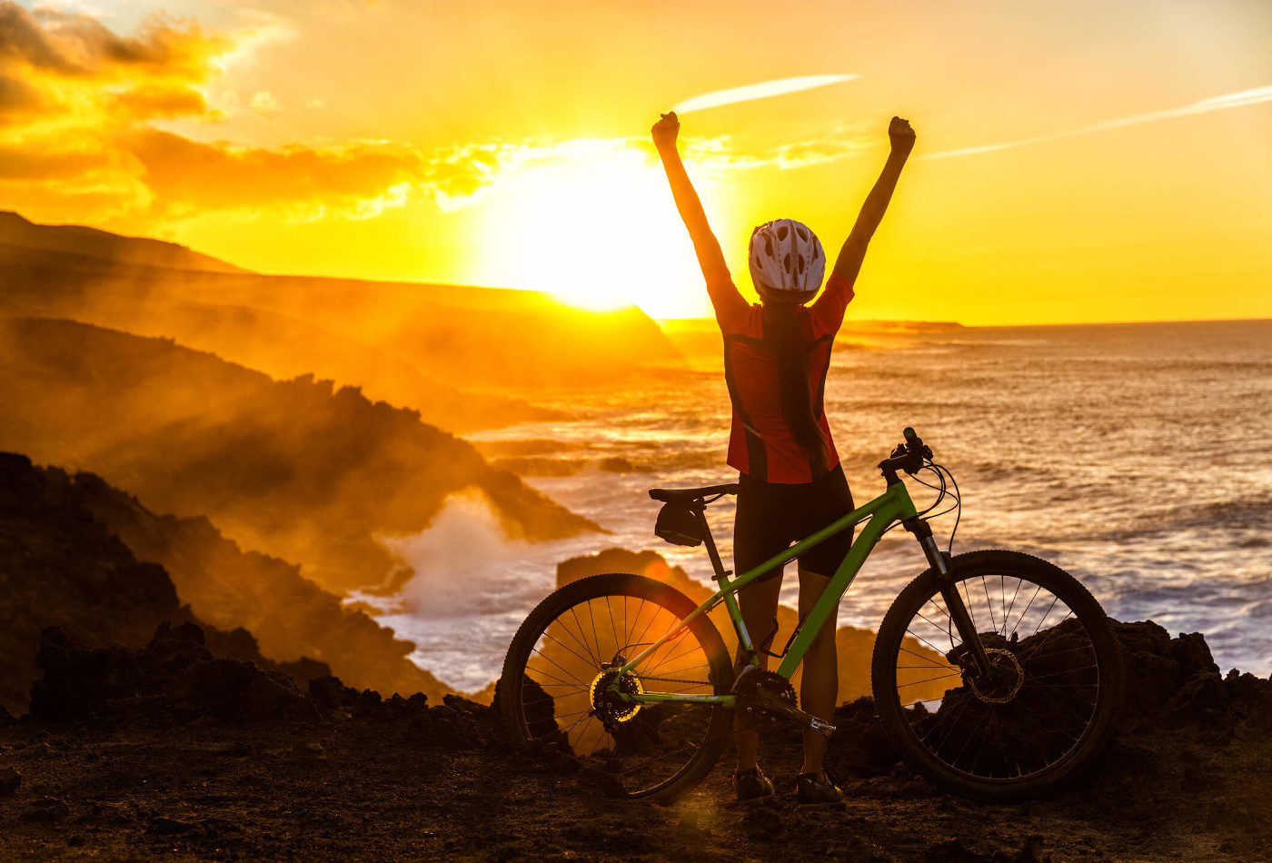 Cycling with sunset in background