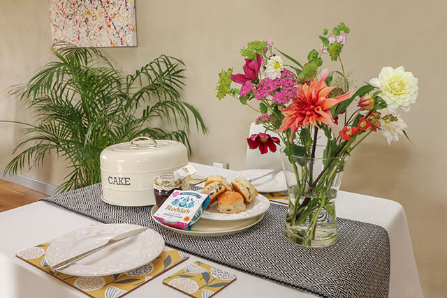 Welcome hamper on table in holiday home