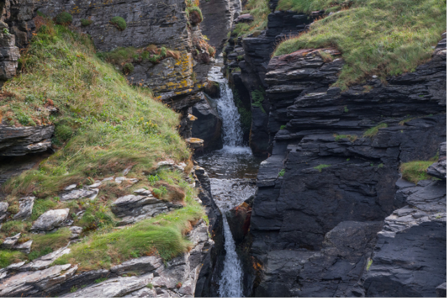A series of waterfalls in Rocky Valley, Cornwall in early autumn.