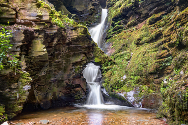 St Nectans Kieve waterfall in St Nectan's Glen valley in North Cornwall.