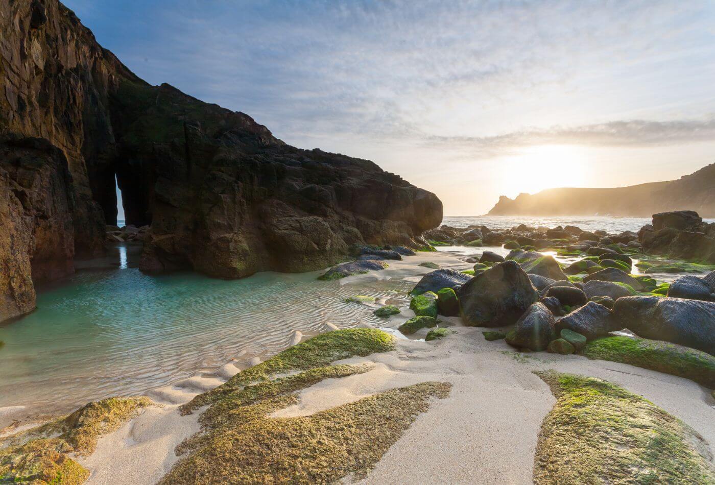 Sunset at Nanjizal, also known as Mill Bay, a beach and cove near Lands End, Cornwall.
