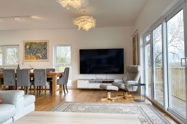 A property called Woodhall, with large TV