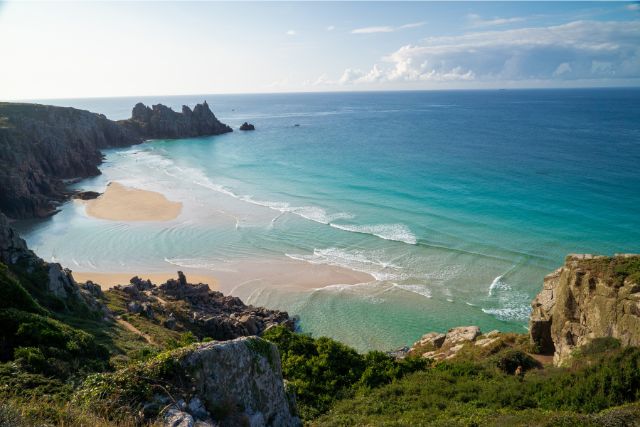 paddleboarding in Cornwall, Porthcurno