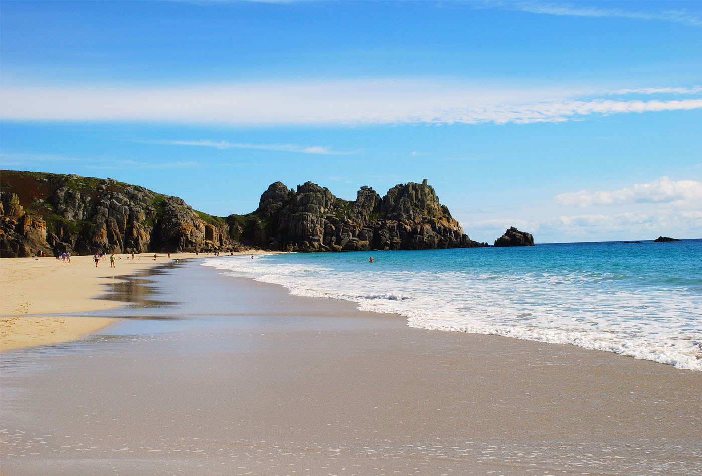 Water lapping on shore of Porthcurno Beach, Cornwall