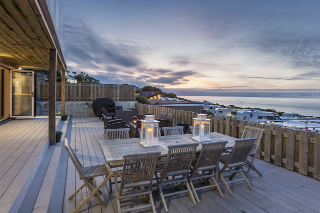 Choosing a Holiday Letting Agency in Cornwall | Sea view from the outdoor seating area at Boscarne