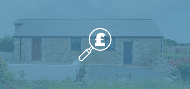 Magnifying glass icon with pound sign inside of it, overlaid on an external shot of a holiday home