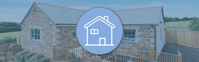 A holiday cottage overlaid with an icon showing a house