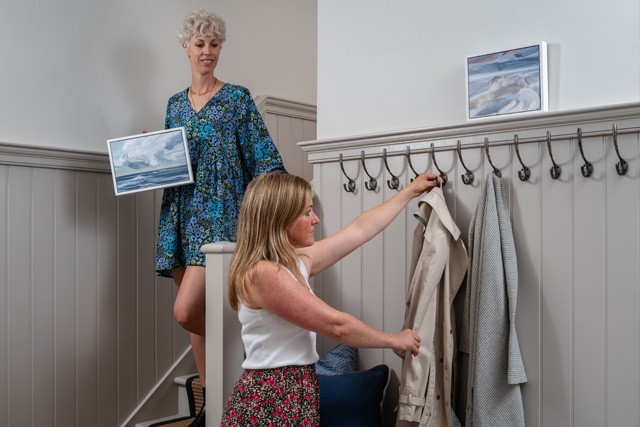 Hollie and Jennie from Studio Far West, adding some finishing touches to an entrance hall