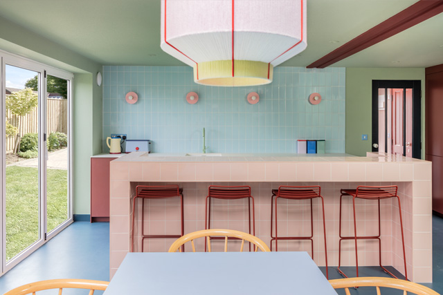A kitchen with light pastel colours, designed by Studio Far West