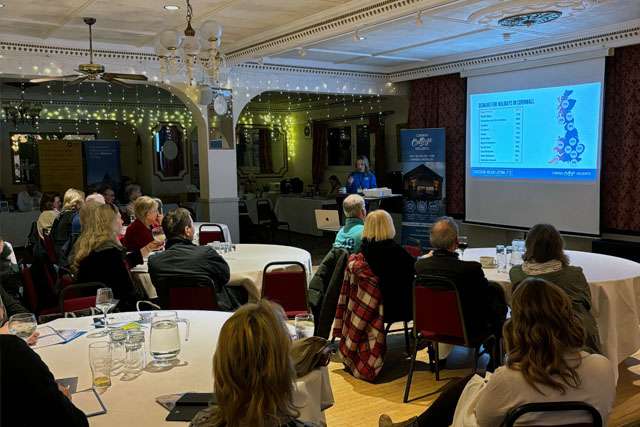 Cornish Cottage Holidays representative presenting about the holiday letting industry to a room of people