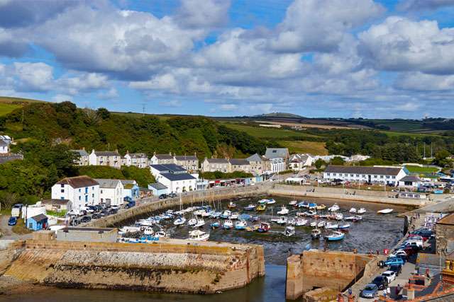 View over Porthleven harbour with town behind